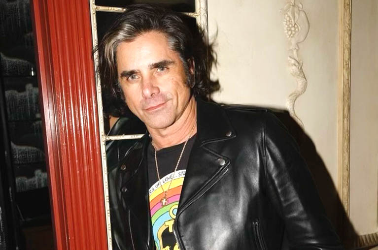 How old is John Stamos?