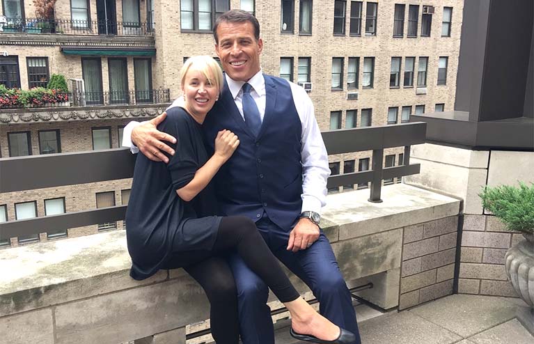 Sage Robbins and her husband Tony Robbins smiling together